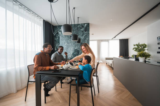 istock Modern Apartment With Multiracial Family at Breakfast Table 1463533387