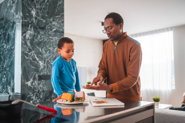 istock Cookie Decorating Weekend for Afro-American Father and Biracial Son 1463533469