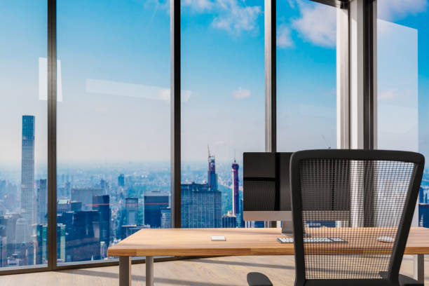 istock large modern office with desk and workspace facing panoramic skyline view; career management concept; 3D Illustration 1463534943