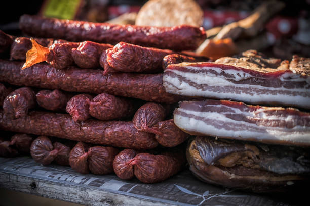 istock Sausages and bacon on a stall 1463536020