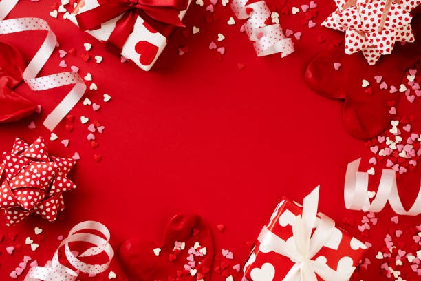 istock Red gift box and balloon on red background 1463537258