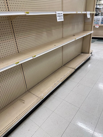 supermarket empty shelves from front on white