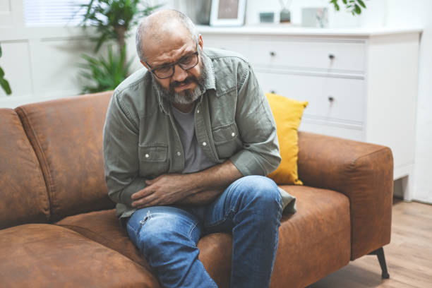 istock Mature adult man in home interior ( negative emotion) 1463552838