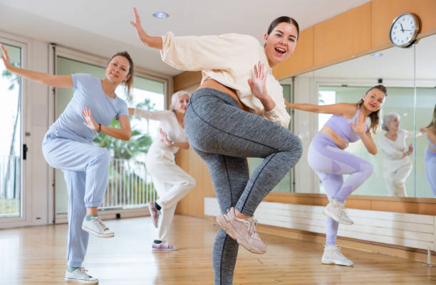 istock Dynamic young woman dancing hip-hop 1463553027