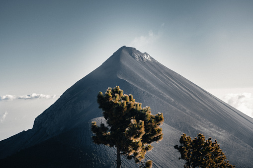 Volcano Fuego in Guatemala as seen from Volcano Acatenango near the colonial town of Antigua Guatemala