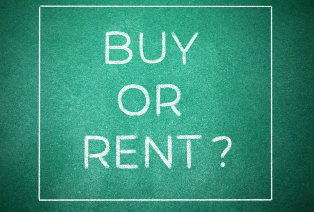 istock Question BUY OR RENT? on green chalkboard, top view 1463555299