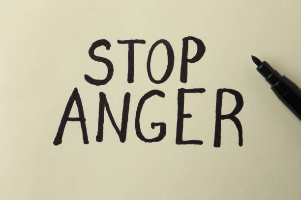 istock Inscription Stop Anger and black felt tip pen on beige background, top view 1463555338