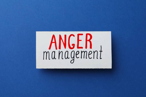 istock Card with words Anger Management on blue background, top view 1463556299