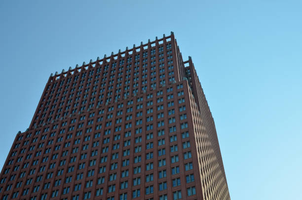 istock Exterior of beautiful modern building against blue sky, low angle view 1463556907
