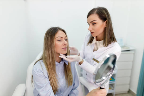 istock Young woman having a consultation with a dermatologist 1463558949