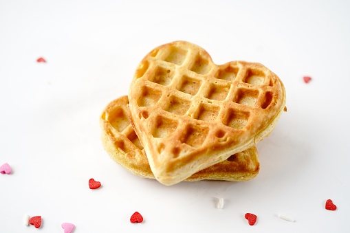 Homemade heart-shaped waffles isolated on white background | Valentine heart waffles