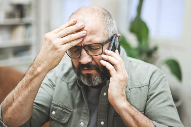 istock Mature adult man in home interior ( negative emotion) 1463562935