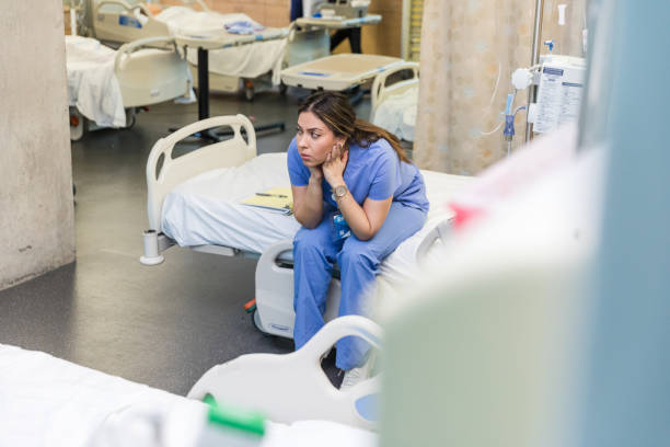 istock High angle view exhausted medical student in mock ER 1463564296