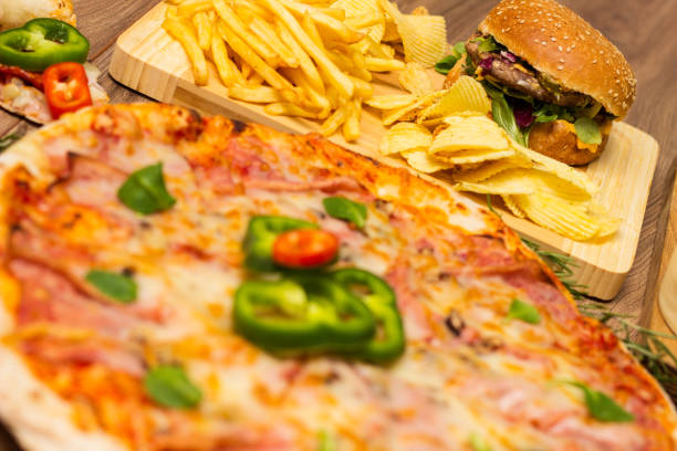 istock Pizza and Hamburger with French fries 1463565922