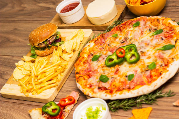 istock Pizza and Hamburger with French fries 1463565941