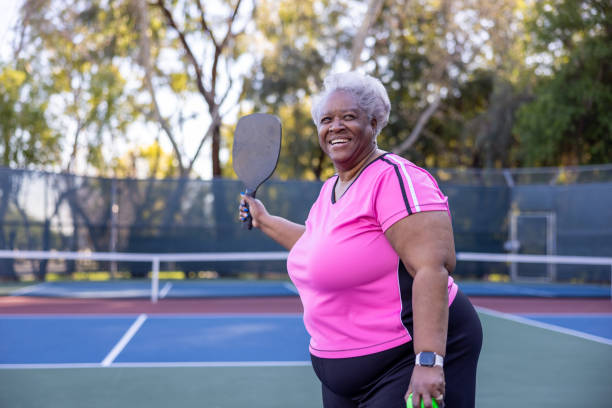 istock Senior Black Couple Playing Pickleball 1463570327