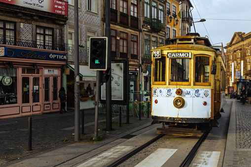Porto, Portugal - December 12, 2018: a tram on a street in Porto, Portugal.