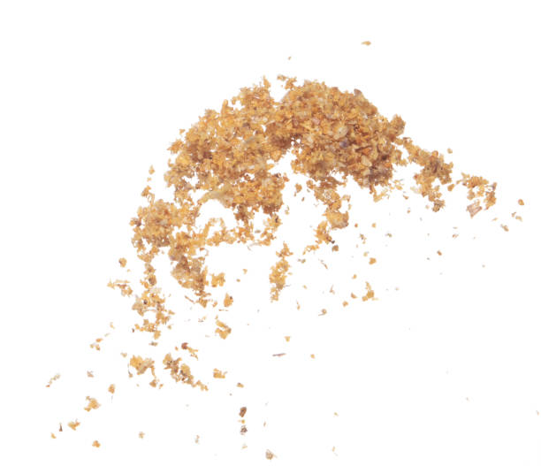 istock Fried Garlic pour fall down explosion, golden yellow fried garlic float abstract fly. Beautiful fried garlic splash stop in air, food object design. White background isolated high speed freeze 1463578506