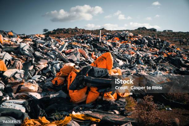 Life Jacket Cemetery In Lesvos Greece Stock Photo - Download Image Now - Refugee, Greece, Refugee Camp