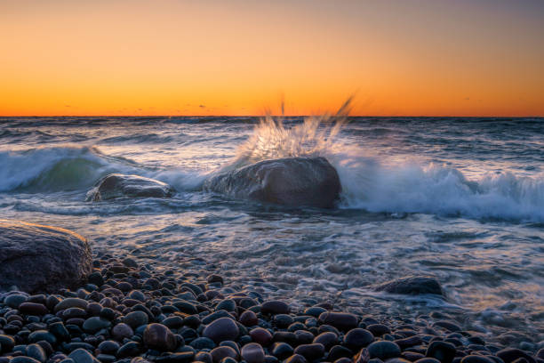 istock sea storm with splash from waves on rocky shore 1463588658