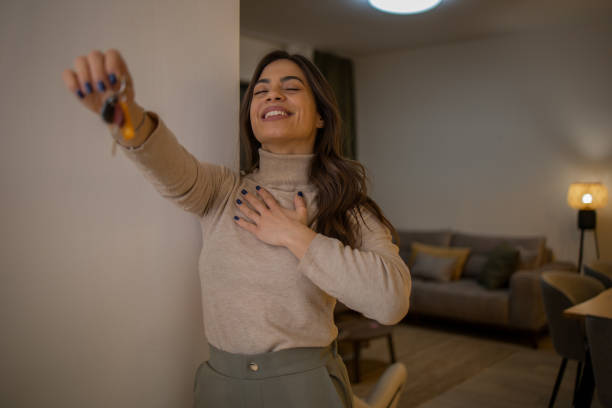 istock Woman moving into a new apartment 1463590569
