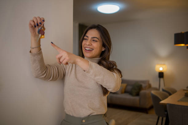 istock Woman moving into a new apartment 1463590573