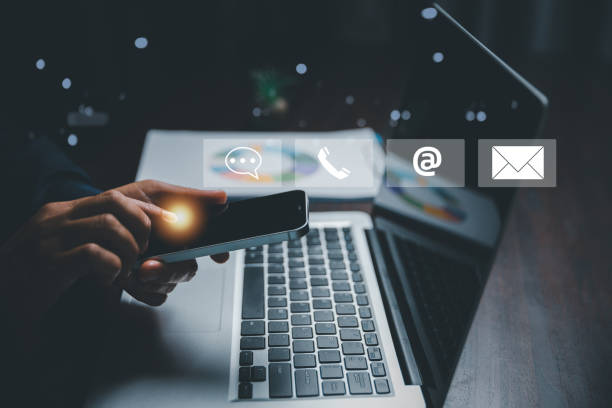istock Customer support hotline contact us people connection concept. Web page online customer service technology idea. Businesswoman using smartphone with email, call phone, address, Chat message icons. 1463593520