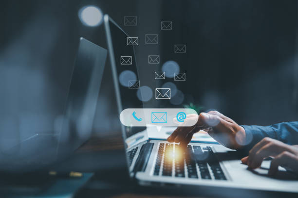 istock Customer support hotline contact us people connection concept. Web page online customer service technology idea. Businesswoman using computer with email, call phone, address, Chat message icons. 1463593521