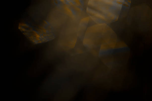Light Flare Overlay Gold Bokeh Light Flare Overlay, taken with an Old Lens, to give Bokeh effect. gold layer stock pictures, royalty-free photos & images