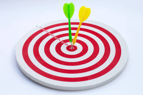 Dart arrow on center of dartboard.