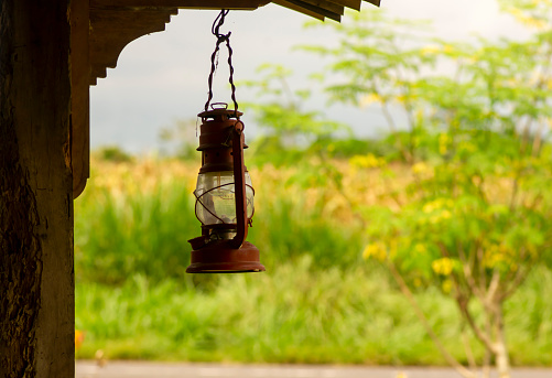An old and antique lantern in a viilage in Yogyakarta, Indonesia
