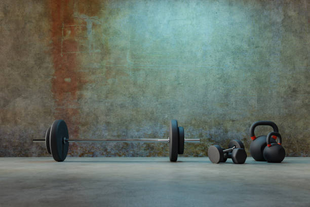 istock gym fitness equipment background, 3d rendering 1463607209