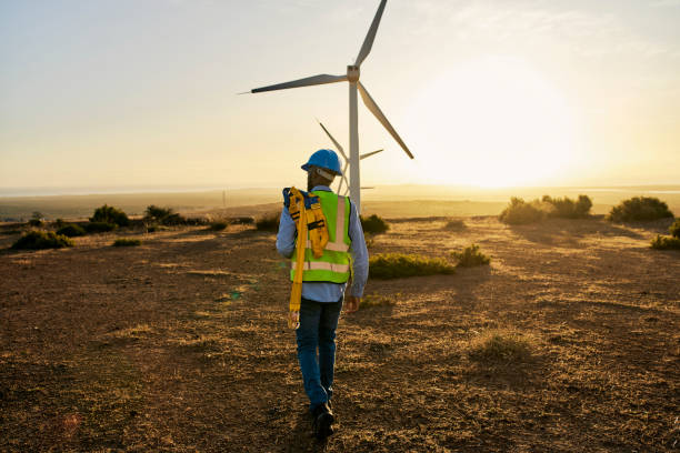 istock Engineer, wind turbine and clean energy, black man and environment, sustainability and natural with technology. Renewable, engineering and agriculture, electricity and windmill inspection and mockup 1463616231