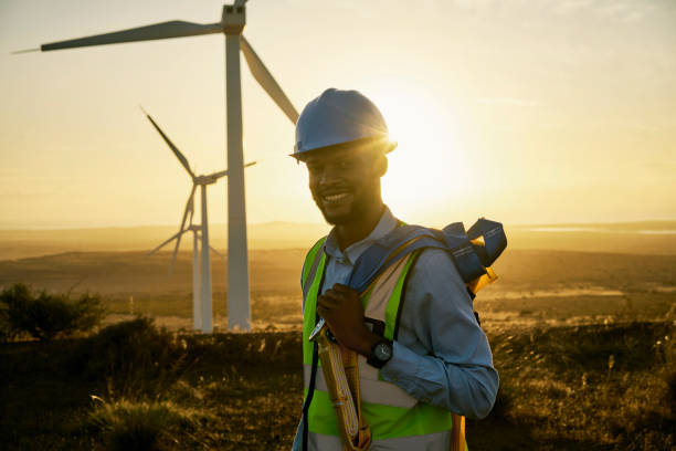 istock Renewable energy, portrait and windmill engineer man in countryside for industrial, development or innovation. Engineering, wind and turbine by guy with vision for future, sustainability and power 1463616243