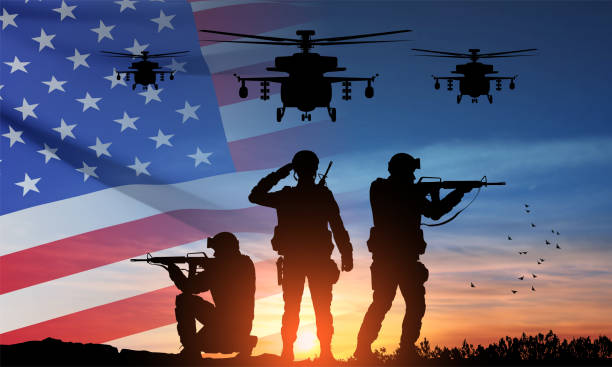 istock Silhouettes of soldiers and military helicopters 1463630986