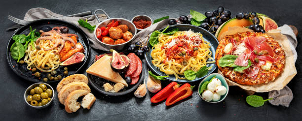 istock Dinner table of italian meals dishes. 1463643209