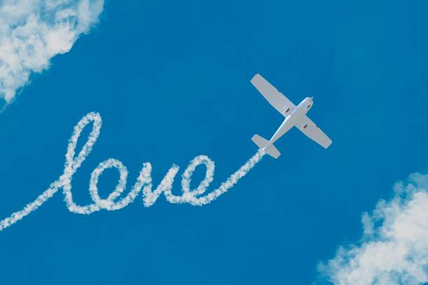 istock Aircraft In The Sky with love text 1463644793