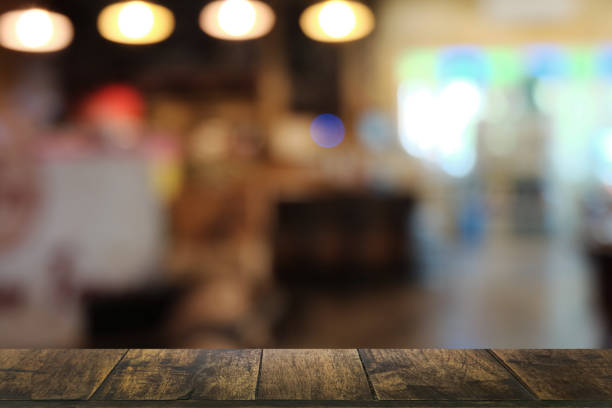 istock Empty dark wooden table background of restaurant . 1463645567
