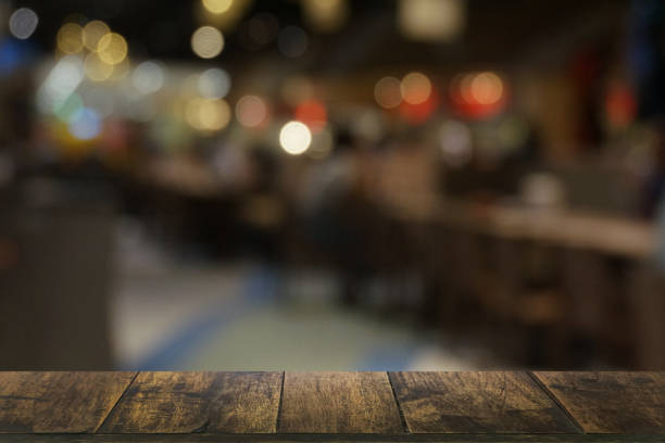 istock Empty dark wooden table background of restaurant . 1463645584