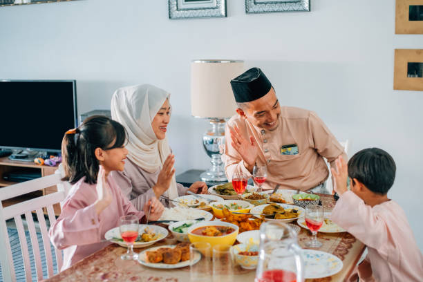 istock Muslim family make video phone call while dinner during Hari Raya 1463646740