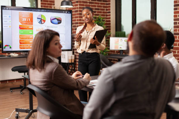 istock African american entrepreneur showing management presentation 1463648577