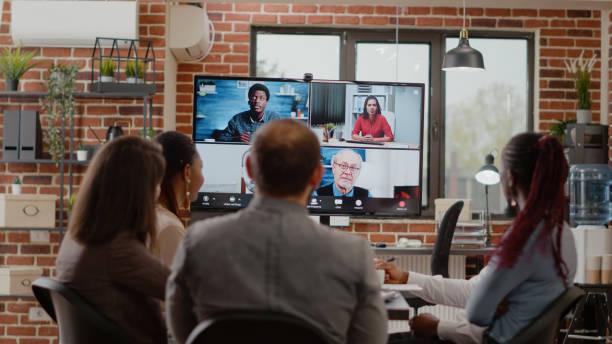 istock People talking to colleagues on video call conference 1463650623