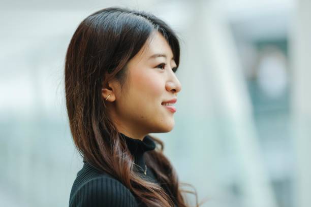 istock Beautiful young woman relaxing at modern corridor 1463651222