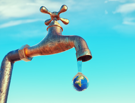 Chrome water tap with earth globe as drop on a blue background. This is a 3d render illustration