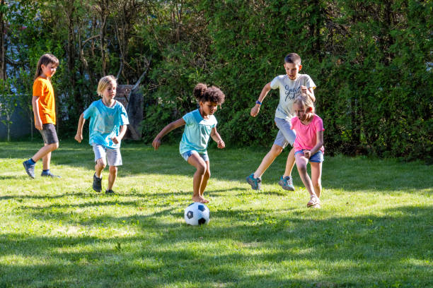 istock Children playing football 1463662045