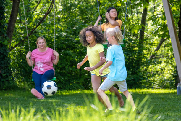 istock Children playing football 1463662046