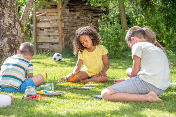 istock Children drawing in garden 1463662047