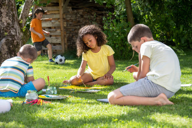 istock Children drawing in garden 1463662052