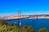 The 25th April Bridge (Ponte 25 de Abril) is a suspension bridge road-rail over the Tagus river that connects the city of Lisbon to the city of Almada. View from Almada