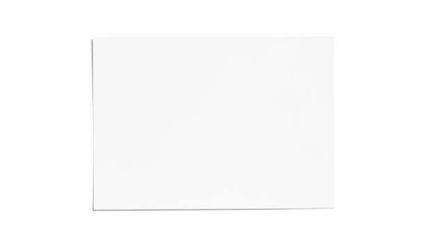 feuille de papier vierge sur fond blanc - textured folded white page photos et images de collection